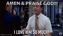 a man in a suit and tie is saying amen and praise god