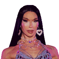 a woman wearing a choker and earrings with a heart on them