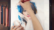 a person is drawing a woman with blue hair on a tablet