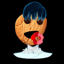 a cookie with a flower in it 's mouth and the word aesop on the bottom