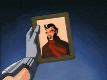A zoom in to the photo of Moriarty transitions to his face on the computer screen