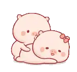a couple of pigs are laying on top of each other .