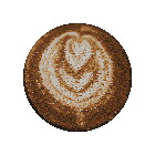 a close up of a cup of coffee with a leaf design