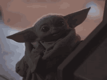 Baby Yoda The Mandalorian GIF - Baby Yoda The Mandalorian Wink GIFs
