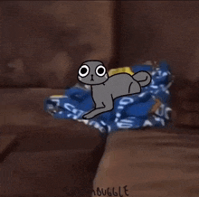 a drawing of a cat standing next to a couch with the word wammbugle written on the bottom