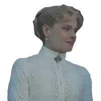a woman wearing a white lace top with a brooch on her collar