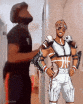 a man is standing next to a cartoon of a football player holding a basketball .
