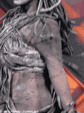 a close up of a woman 's torso with a watermark that says tumblr