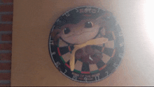 a dart board with a picture of a baby on it
