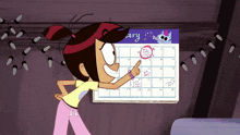 a girl points at a calendar that says january
