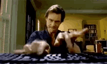 Typing Jim Carrey GIF - Typing Jim Carrey Work GIFs