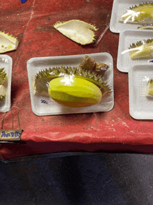 a tray of durian sits on a table