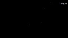 a computer generated image of a snowflake with a tv dallas logo in the lower right corner .