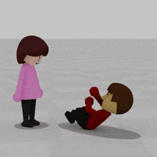 a girl in a pink sweater stands next to a boy laying on the floor