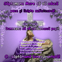 a picture of jesus holding a cross with purple flowers surrounding him