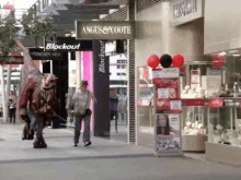 a store called angus & coote has a sign that says blockout on it