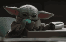 Baby Yoda Cookie GIF - Baby Yoda Cookie The Mandalorian GIFs
