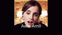 a close up of a woman 's face with the words aww amid written below her
