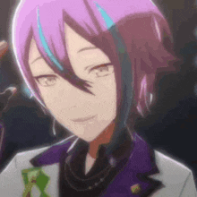 a close up of a person 's face with purple hair and a purple jacket .