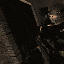 a man in a helmet is holding a rifle with the letter o on it