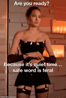 a woman in a black dress and stockings is asking if she is ready because it is quiet time