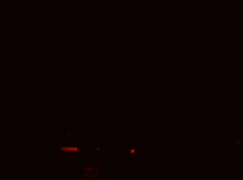 a sign that says who is alive is lit up