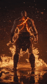 a man is surrounded by flames and smoke