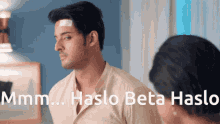 a man with a bandage on his forehead looks at a woman with the words haslo beta haslo written below him