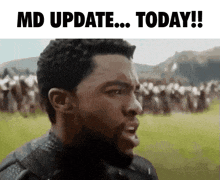 a man is making a funny face with the words md update today written above him