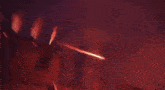 a statue of a demon is surrounded by fire