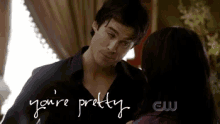 a picture of a man and woman with the words you 're pretty