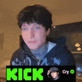 a man in a black hoodie with the word kick in green