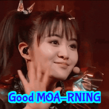 a picture of a girl with the words good moa-rning on the bottom