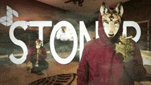 a man with a wolf mask is smoking a cigarette in front of the word stoned