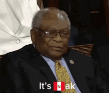 a man in a suit and tie is saying it 's ok