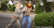a dumbto advertisement shows a man being held by a monkey