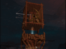 a statue of a monster in a cage is being held by a giant hand