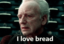 a man with a sad look on his face and the words i love bread below him