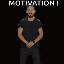 a man is standing in front of a fire with the words `` motivation ! do it ! '' .