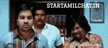 a group of men standing in front of a sign that says starttamilchat in