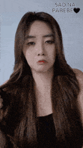 a woman with long hair is making a sad face and the words sad na pabebe are above her