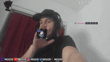 a man wearing headphones and a hat with the number 41 on the bottom right