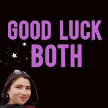 a woman is smiling in front of a sign that reads good luck both