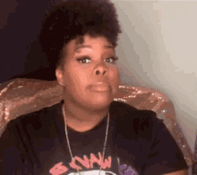 a woman wearing a black t-shirt that says bonnie on it