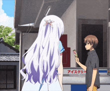 a girl with long white hair is standing next to a man holding an ice cream cone with chinese writing on it