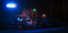 Let'S See What'S On GIF - Lego Batman Lego Batman Movie Watching Tv GIFs
