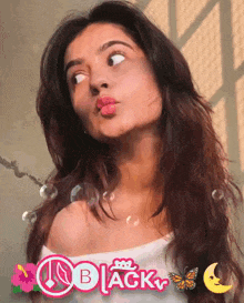 a woman is making a funny face with the word black in the background