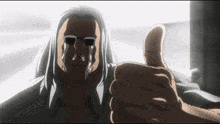 a man with tears running down his face gives a thumbs up
