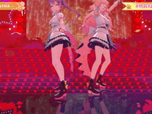 two anime girls are dancing on a stage with a sign that says #nima