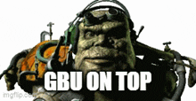 a statue of a man with the words " gbu on top " written on it
